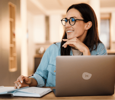 Woman working on updating UTM parameters on her laptop